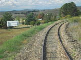 As the railway continues right, the Cooma highway continues northeast.