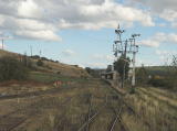 The rail car crosses the points leading up to Cooma station.