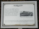A sign gives the history of the barracks at Cooma railway station.