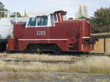 A shunting engine X203 next to the good platform at the Yass Railway Museum.