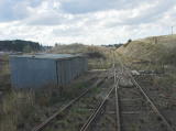 The last set of points to join up with the main line north of Cooma. The cutting and sheds can be seen clearly.