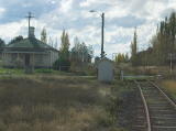 The line continues climbing out of Cooma. Here we're approaching a railway crossing.