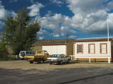 The car park at the northern end of Cooma station. At the top of the hill is a microwave station and repeater for SBS television.