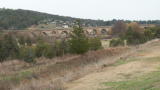Two railway structures: a viaduct for the main line through to Sydney, and a small cutting in the foreground for the Crookwell line.