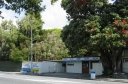 Looking across Woburn Road towards the Bellevue dairy. Behind the camera is the Hutt Recreation Ground.
