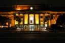Wellington Railway Station. The words 'Railway Station' can be made out above the columns. The perspective has moved slightly so that a parking sign is in front of the main entrance.