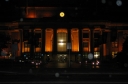 Wellington Railway Station at night. The faster exposure time plus the flash shows that spots of water are falling in front of the lens. The clock is easier to read in this shot.