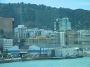 Looking out towards the Queens Wharf Event Centre from Te Papa. Reflections off the window are visible on the right hand side.
