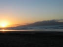 The sun sets on the last day of 2003 next to Kapiti Island.