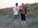 Haydn and Snaiet pose for a photo on Peka Peka beach.