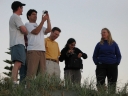 Mauricio takes one last shot as the rest of the gang watch the sunset.