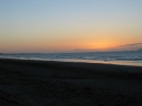 The orange sky shows where the sun has just set.