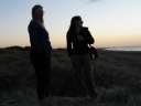 Denise and Shami look out towards the Tasman Sea.