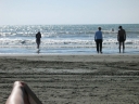 Snaiet decides to come out of the water, while Jann and Mauricio continue to dabble their toes. Denise's right arm is in the bottom left of the photo.
