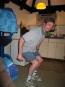 Haydn pauses while playing Pictionary-charades. This is similar to charades, but using the Pictionary board and questions.