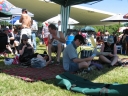 Snaiet, Paul, Haydn, and Denise under the gazebo at Tauherenikau race course. Haydn and Denise are studying form.