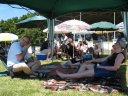Willie, Snaiet, and Denise under the gazebo at Tauherenikau.
