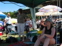 Sue, Denise, and others watch the end of another race.