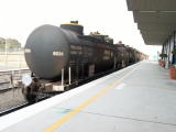 The oil train departs late out of Canberra, due to a late running Explorer service.