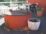 A water supply(?) at the southern end of the station building.