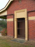 A locked steel door at Binalong station.
