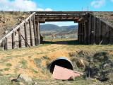 The eastern side of De Salis bridge, with the replacement drainage pipe underneath. Erik in the background.