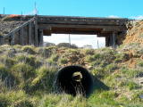 The western side of De Salis bridge, and a clear view through the replacement drain pipe.