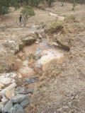 A closer look at the scar caused by flood waters on the up side of the railway track, around 341.77km.