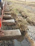 Scouring of the track base, on the down side of the railway line, near 343.4km.