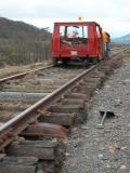 Sleepers and vegetation along the railway line near 341.7km, looking up towards the Tuggeranong valley.