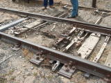 A closer look at the point mechanism for Tuggeranong siding. A new layer of topsoil and vegetation has been washed onto part of the mechanism.