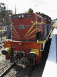 Diesel 7319 decouples from the Royalla train after entering Queanbeyan station from Canberra. In the background the main line continues on to Goulburn and Sydney.