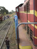A look along the side of diesel 7319 and the loop line at Royalla station.