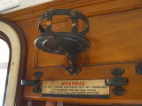 A warning sign inside one of the carriages.