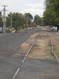 Another kink in the rail at the northern end of Dutton street in Yass, looking southeast towards the Yass Railway Museum.